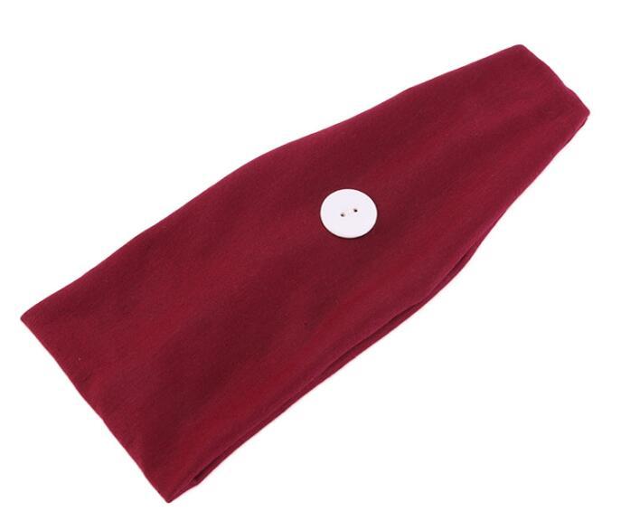 Button sports headband